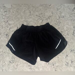 Like New Lululemon Black Hotty Hots 4 inch Size 4